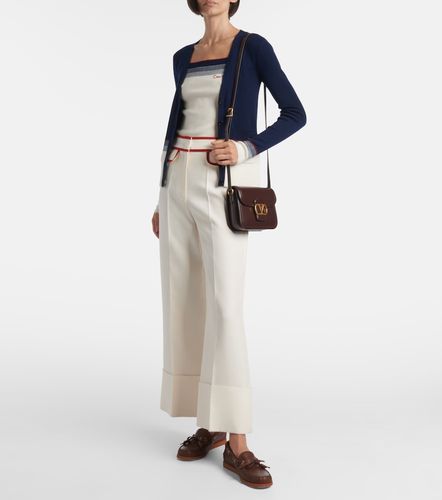 Cardigan rayé en laine vierge - Valentino - Modalova