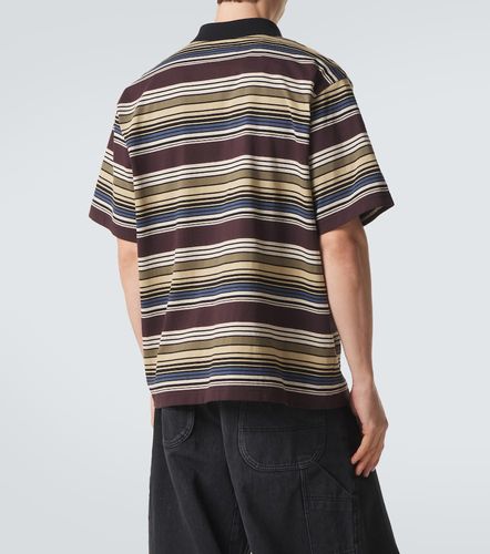 Sacai Polo rayé en coton - Sacai - Modalova