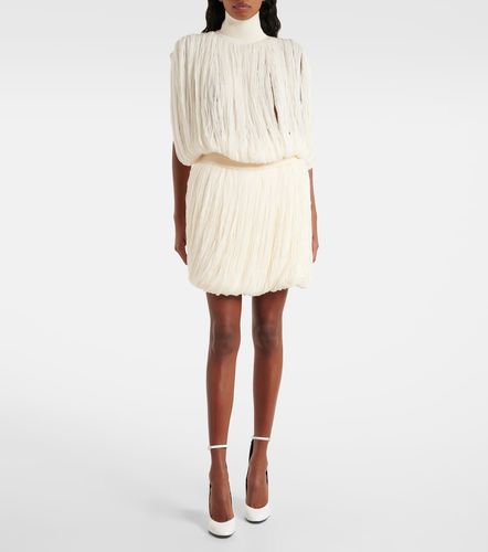 Alaïa Mini-jupe en laine à franges - Alaia - Modalova