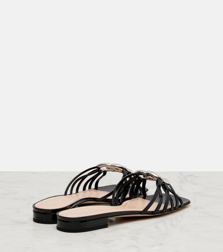 Mules Interlocking G en cuir verni - Gucci - Modalova