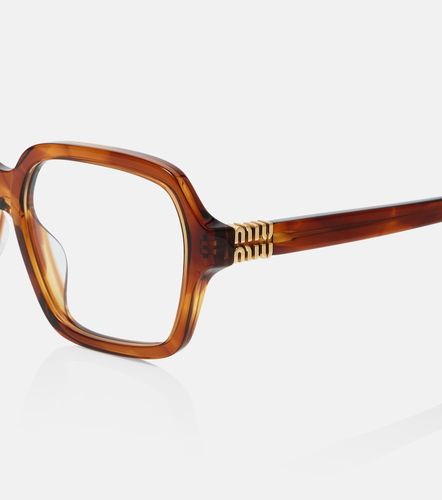 Miu Miu Lunettes carrées à logo - Miu Miu - Modalova