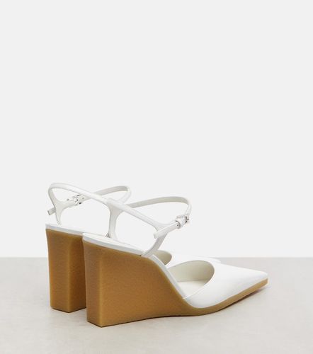 Alaïa Escarpins compensés 90 en cuir verni - Alaia - Modalova