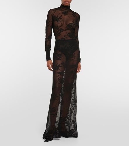 Alaïa Jupe longue en résille à fleurs - Alaia - Modalova
