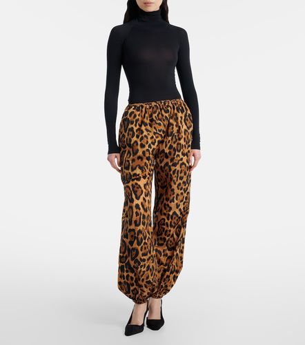 Alaïa Pantalon fuselé à imprimé léopard - Alaia - Modalova