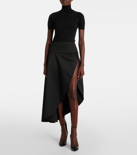 Alaïa Jupe midi asymétrique en laine - Alaia - Modalova