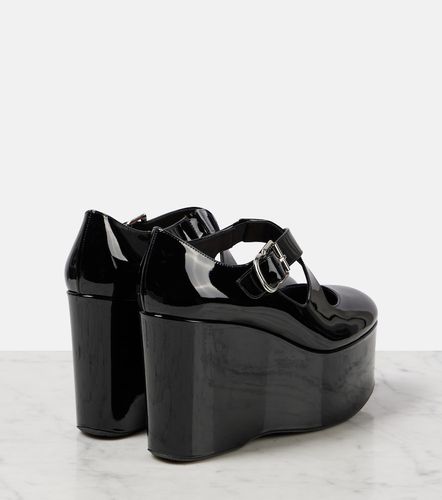 Alaïa Escarpins compensés Criss Cross en cuir verni - Alaia - Modalova