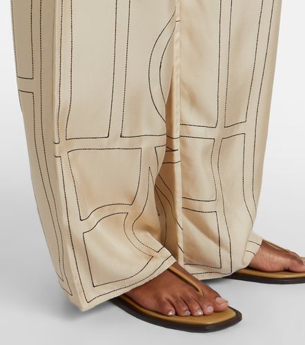 Pantalon ample Logo en soie à taille mi-haute - Toteme - Modalova