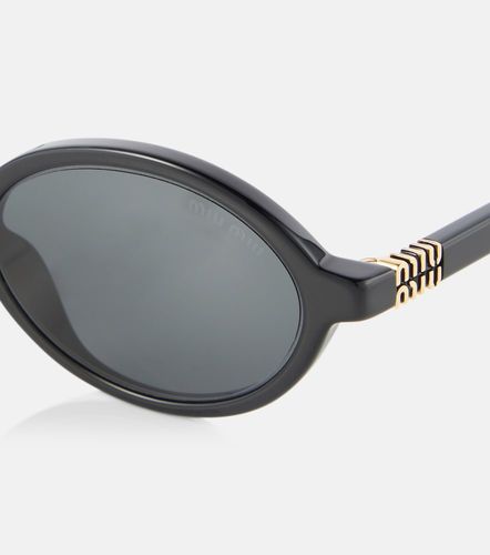 Lunettes de soleil rondes à logo - Miu Miu - Modalova
