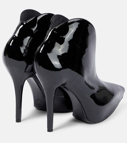 Alaïa Bottines Booties Slick en cuir verni - Alaia - Modalova