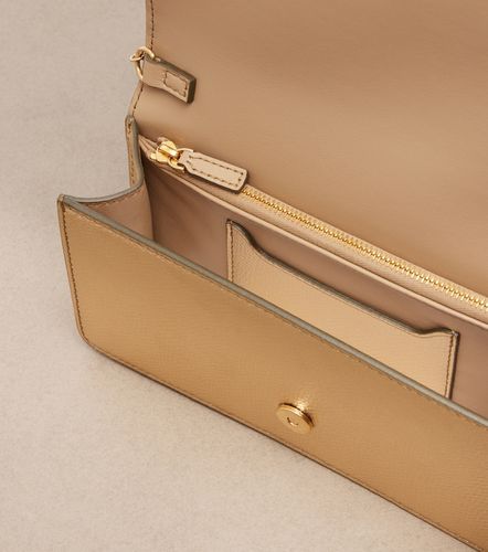 Pochette VLogo Mini en cuir métallisé - Valentino Garavani - Modalova
