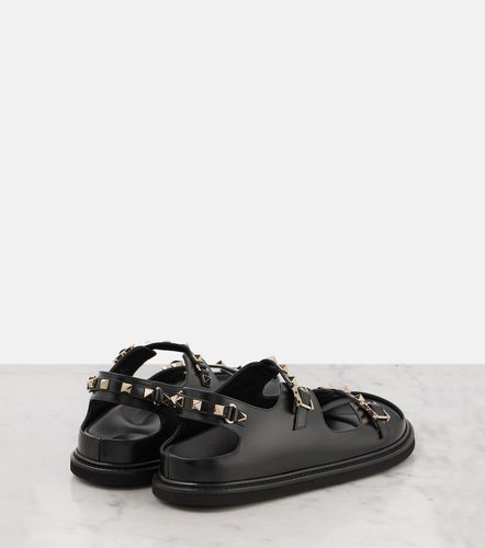Sandales plates Rockstud en cuir - Valentino Garavani - Modalova