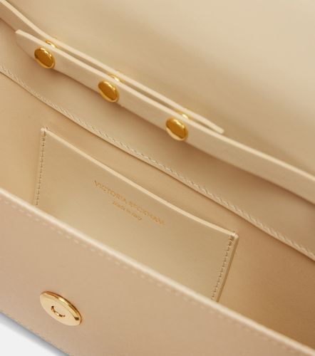Pochette Dorian East-West en satin - Victoria Beckham - Modalova