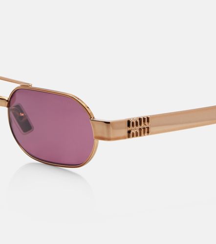 Lunettes de soleil ovales à logo - Miu Miu - Modalova