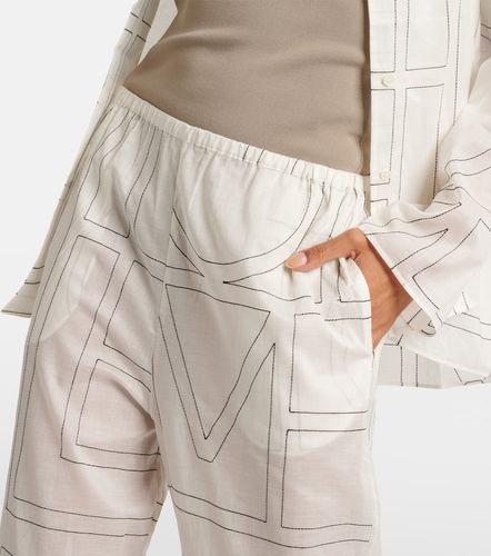 Pantalon ample Monogram en coton mélangé - Toteme - Modalova