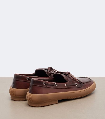 Miu Miu Chaussures bateau en cuir - Miu Miu - Modalova