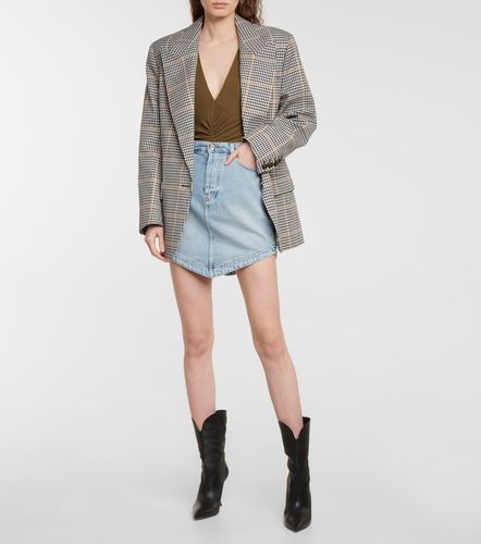 Mini-jupe en jean asymétrique - Alexandre Vauthier - Modalova