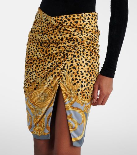 Versace Mini-jupe imprimée - Versace - Modalova