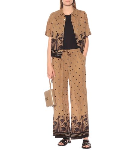 Undercover Pantalon ample imprimé - Undercover - Modalova