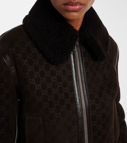 Gucci Veste GG en cuir et shearling - Gucci - Modalova