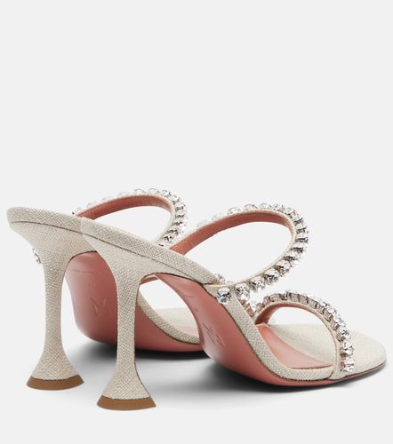 Mules Gigi en toile à ornements - Amina Muaddi - Modalova