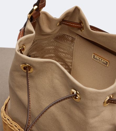 Prada Sac seau en toile et osier - Prada - Modalova