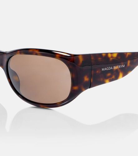 Lunettes de soleil rondes à logo - Magda Butrym - Modalova