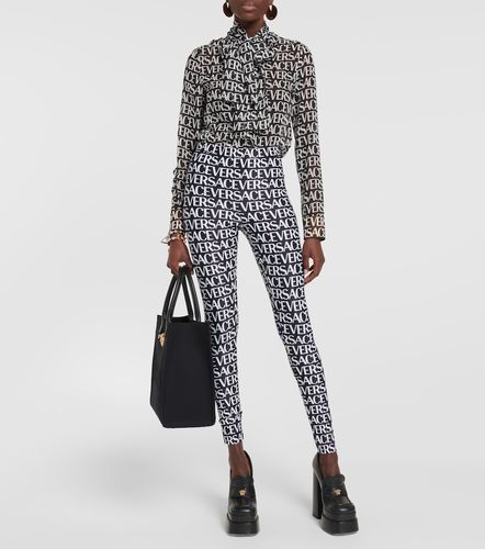 Versace Legging imprimé à logo - Versace - Modalova