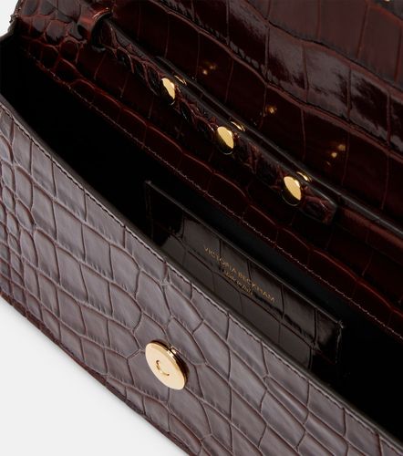 Pochette Dorian East-West en cuir façon croco - Victoria Beckham - Modalova