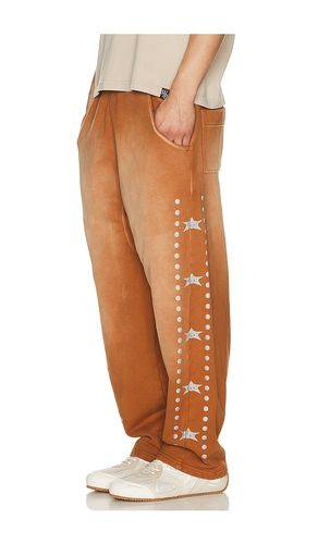 PANTALON SWEAT en . Taille S. Also en M, L, XL/1X - Barriers Worldwide - Modalova