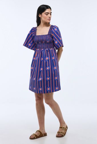Robe mini à manches courtes et à smock imprimée en coton BIO GOTS - CAROLINE DE BENOIST X MONOPRIX - MONOPRIX CREATEURS - Modalova