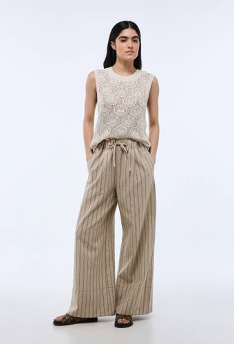 Pantalon rayé taille élastiqué large en lin - MONOPRIX - Modalova