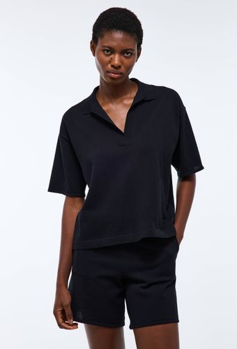 Polo uni en maille de coton - MONOPRIX - Modalova
