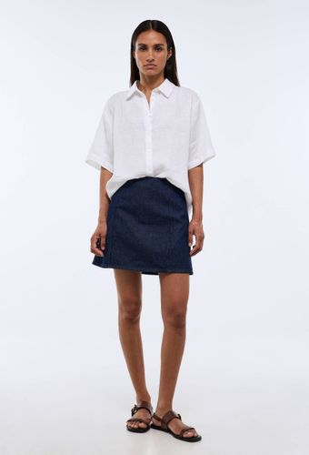 Jupe courte en denim - MONOPRIX - Modalova