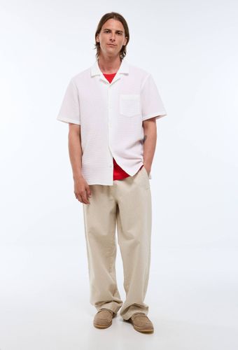 Chemise manches courtes gaufrée en coton bio GOTS - MONOPRIX - Modalova