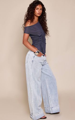 Light Blue Jean Large À Revers Imprimé Léopard Blanc Et Noir | Taille 32 - PrettyLittleThing - Modalova