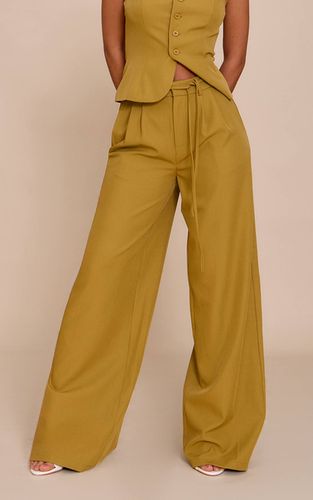 Mustard Pantalon Large Tissé Ajusté Avec Détail Nœud À La Taille | Taille 42 - PrettyLittleThing - Modalova