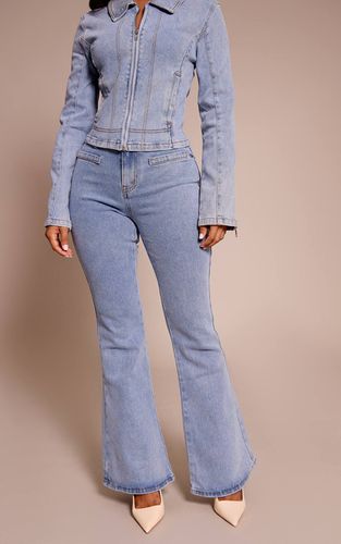 Light Blue Jean Évasé En Denim Petite Avec Poches Avant | Taille 42 - PrettyLittleThing - Modalova