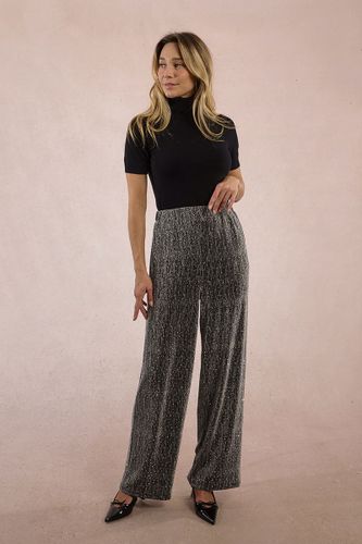 Pantalon en maille irisée, parsemé de strass - MOLLY BRACKEN - Modalova
