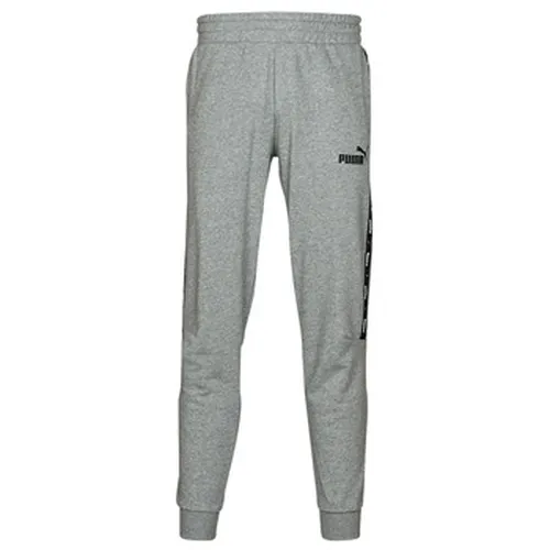 Jogging Puma ESS+ TAPE SWEATPANT - Puma - Modalova