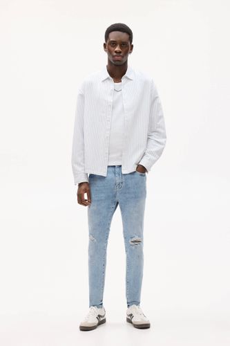 Jean Carrot Fit Déchiré - Pull&Bear - Modalova